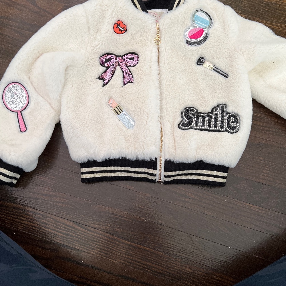 Faux fur jacket with patches